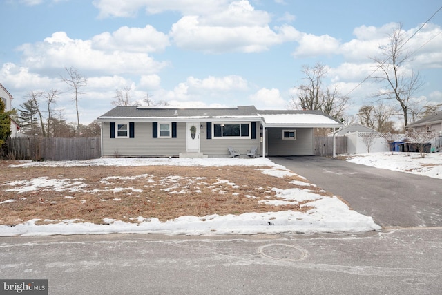 single story home with a carport