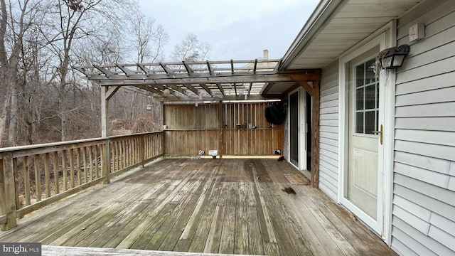 wooden deck with a pergola