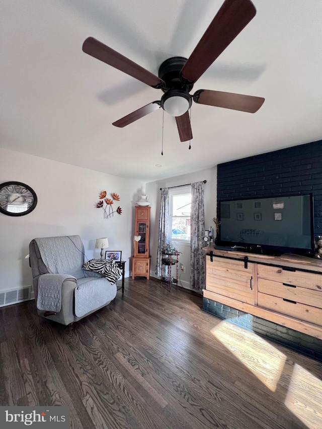 living room featuring dark wood-type flooring