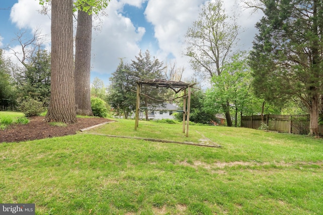 view of yard with fence