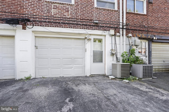 garage featuring central air condition unit