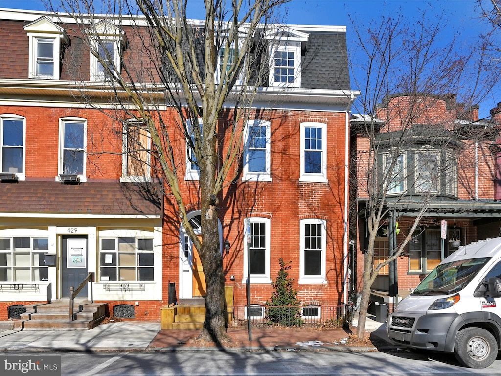 view of property featuring cooling unit