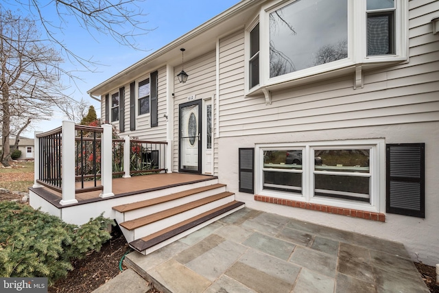 back of house with a patio