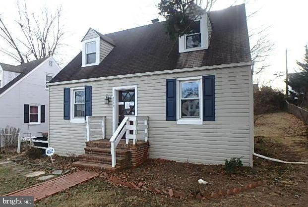 view of new england style home