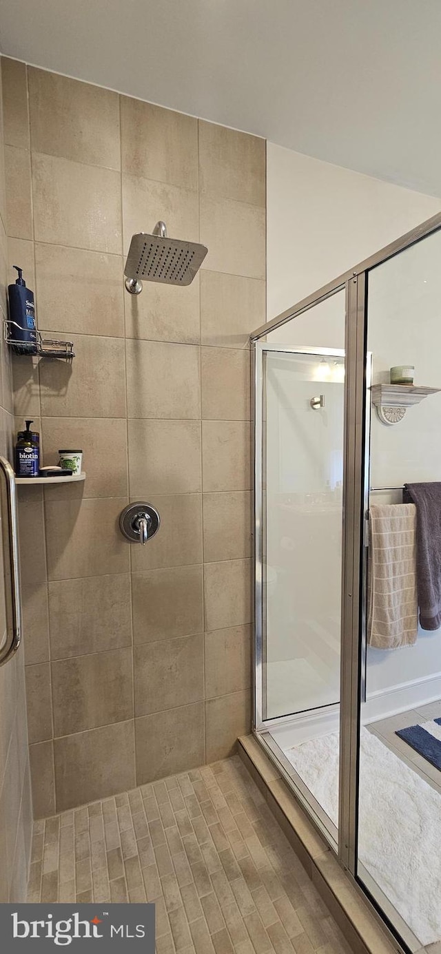 bathroom with an enclosed shower