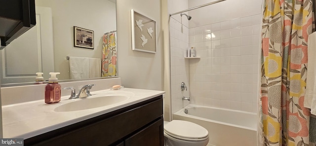 full bathroom featuring toilet, vanity, and shower / bathtub combination with curtain