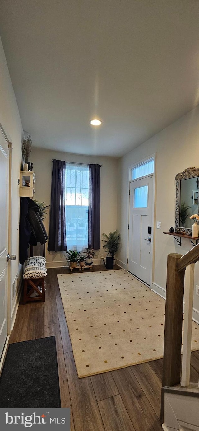 foyer featuring dark hardwood / wood-style floors