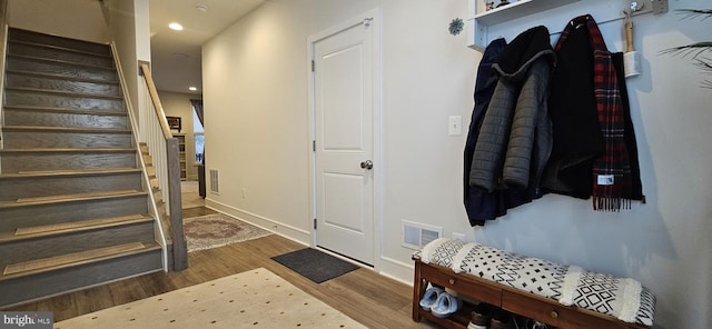 mudroom featuring wood-type flooring