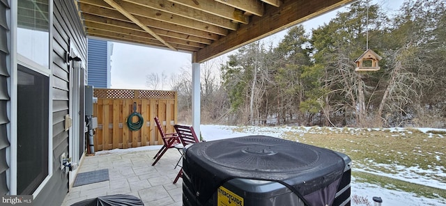 view of snow covered patio