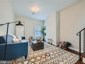 living room featuring wood-type flooring