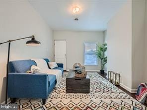 living room with hardwood / wood-style floors