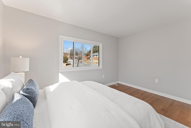 bedroom featuring hardwood / wood-style flooring