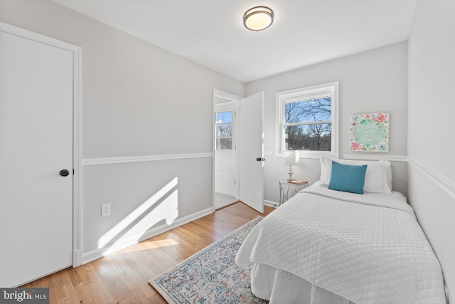 bedroom with light hardwood / wood-style flooring