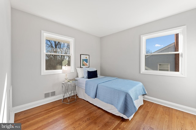 bedroom featuring hardwood / wood-style flooring