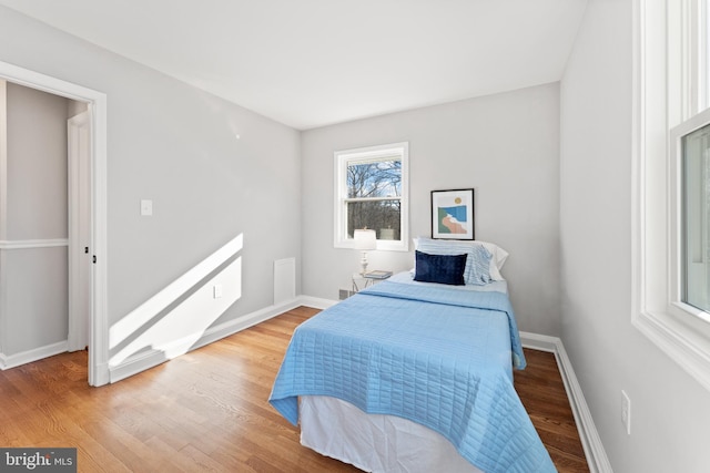 bedroom featuring hardwood / wood-style floors