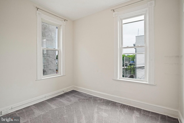 1324 Montello Ave NE, Washington, DC 20002 - spare room featuring dark carpet and baseboards