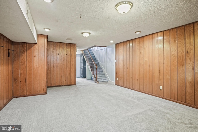 1324 Montello Ave NE, Washington, DC 20002 - finished below grade area featuring wooden walls, stairs, carpet, a textured ceiling, and baseboards