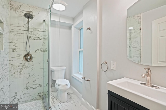 1324 Montello Ave NE, Washington, DC 20002 - bathroom featuring a marble finish shower, marble look tiles, vanity, toilet, and baseboards