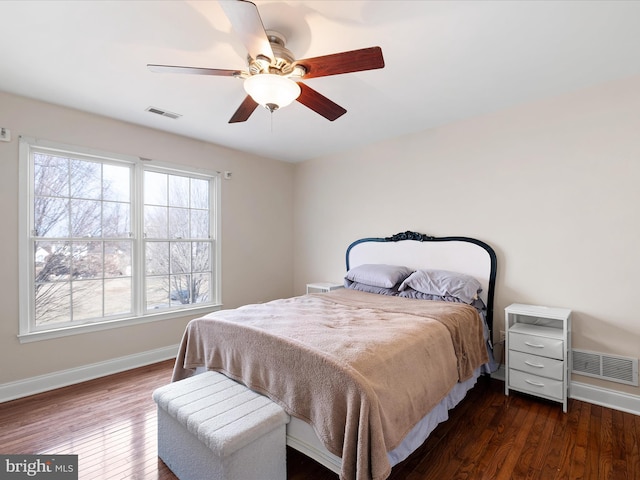 bedroom featuring dark wood-type flooring and ceiling fan