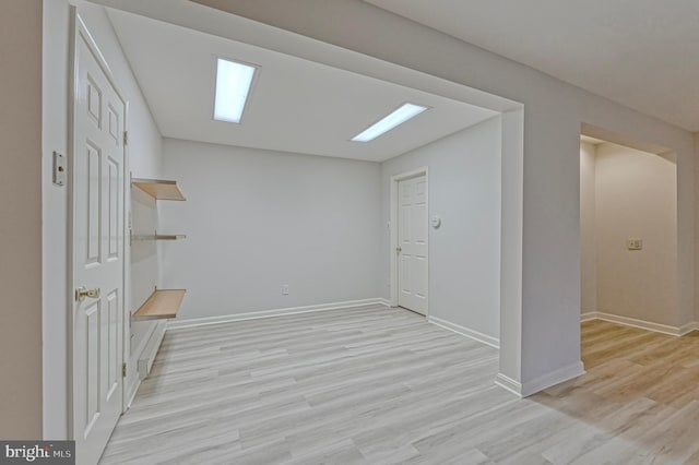 unfurnished room featuring light wood-type flooring