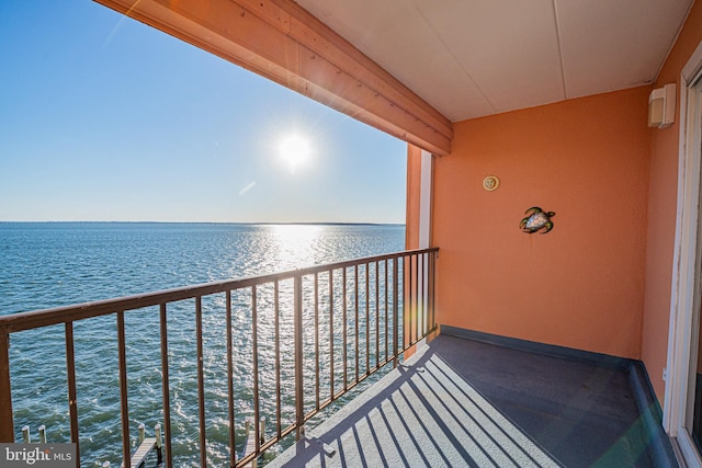 balcony featuring a water view