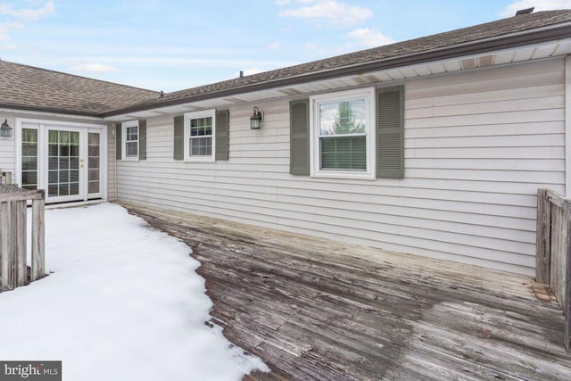 view of snow covered deck