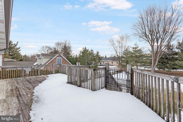 view of snow covered deck