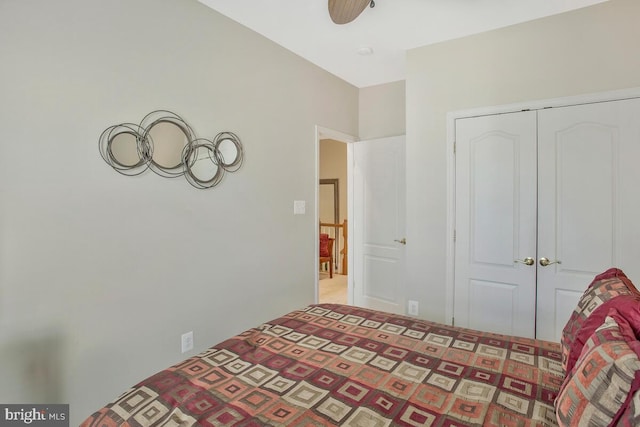 bedroom with carpet flooring and a closet