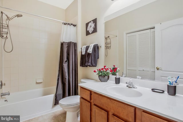 full bathroom featuring vanity, tile patterned flooring, shower / bath combination with curtain, and toilet