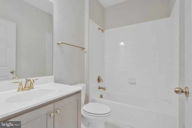 full bathroom featuring vanity, bathing tub / shower combination, tile patterned floors, and toilet