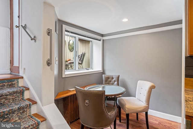 dining room featuring wood-type flooring