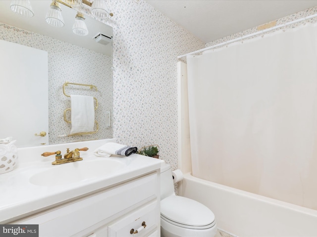 full bathroom featuring vanity, toilet, and shower / bath combo with shower curtain