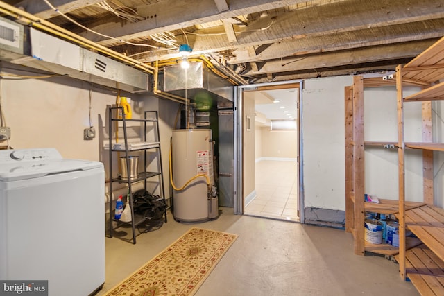 basement featuring washer / dryer and gas water heater