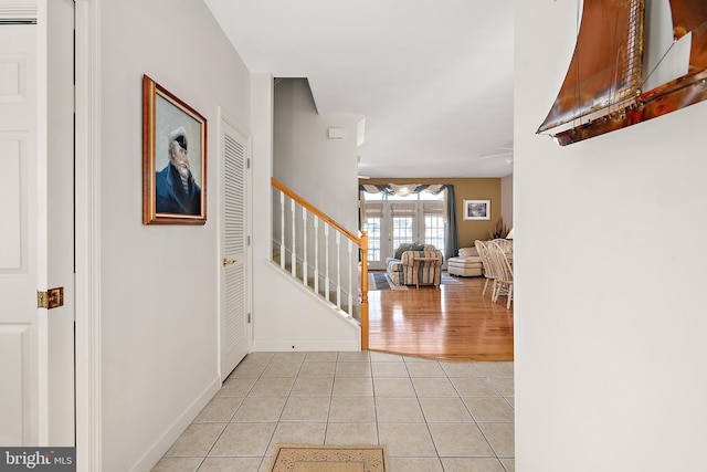 foyer with light tile patterned floors