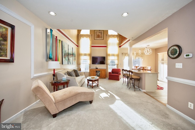 sitting room with baseboards, carpet flooring, and recessed lighting