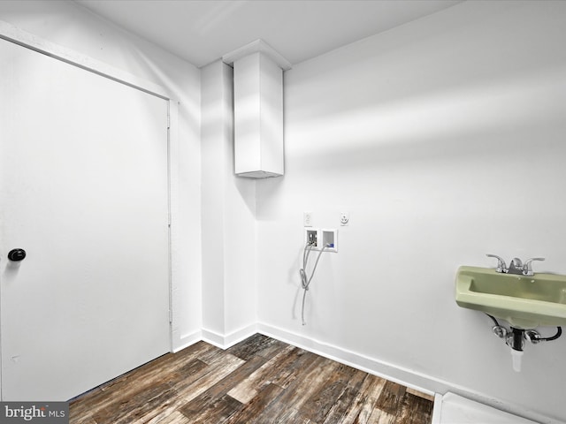 laundry area with sink, washer hookup, and dark hardwood / wood-style flooring