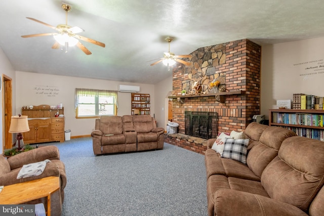 carpeted living room with lofted ceiling, a wall mounted air conditioner, ceiling fan, and a brick fireplace