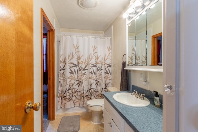 full bathroom with vanity, toilet, and shower / bath combo