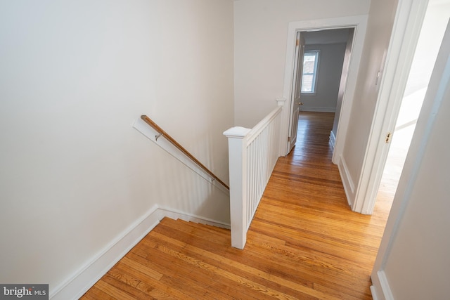 corridor featuring light hardwood / wood-style floors