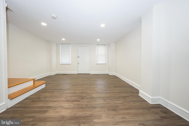 foyer with dark hardwood / wood-style floors