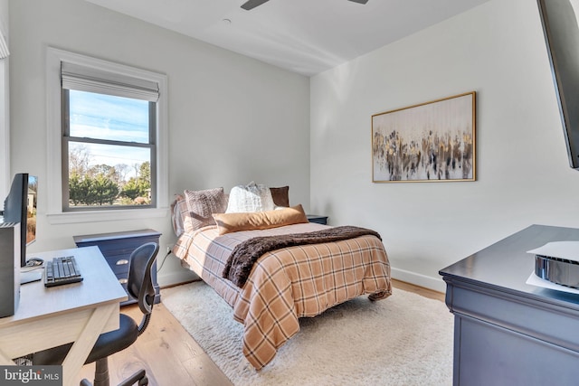 bedroom with light hardwood / wood-style flooring