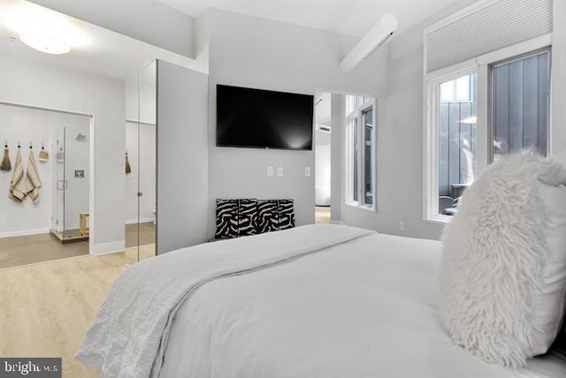 bedroom with light hardwood / wood-style floors