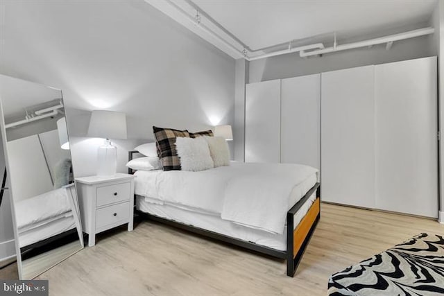 bedroom featuring light hardwood / wood-style flooring