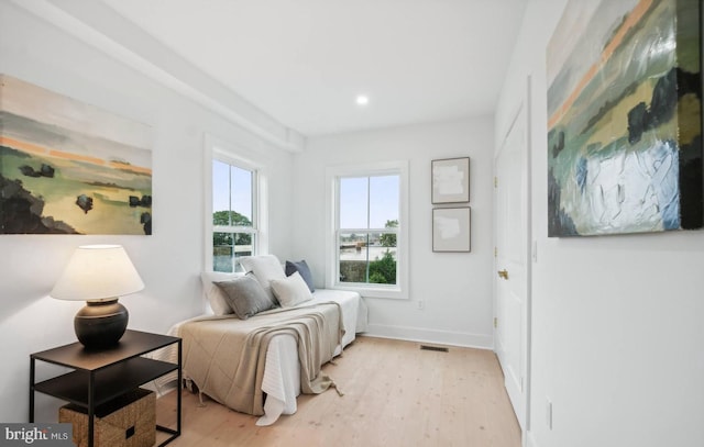 bedroom featuring light wood-type flooring