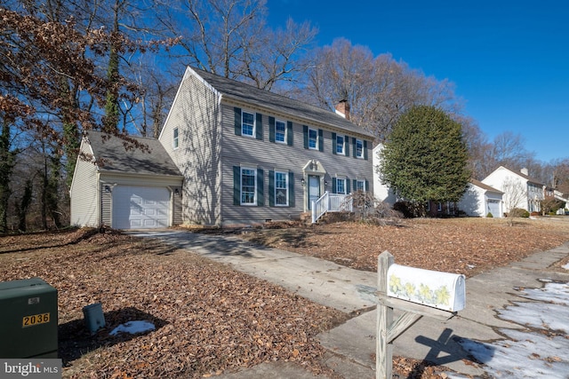 colonial home featuring a garage