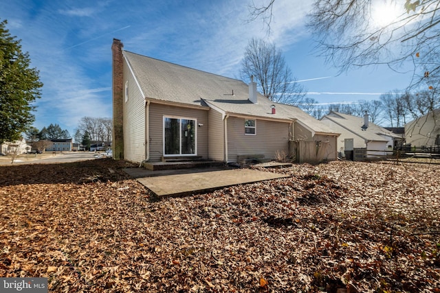 back of property with a patio area