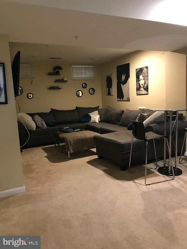 living room with light colored carpet