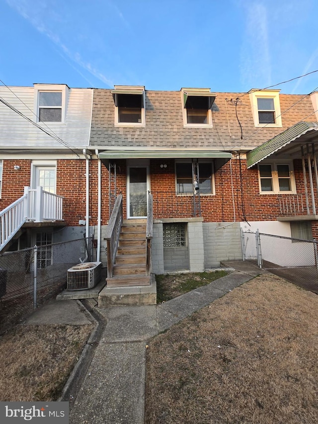 view of front of property with central AC unit