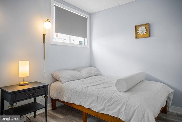 bedroom featuring hardwood / wood-style floors