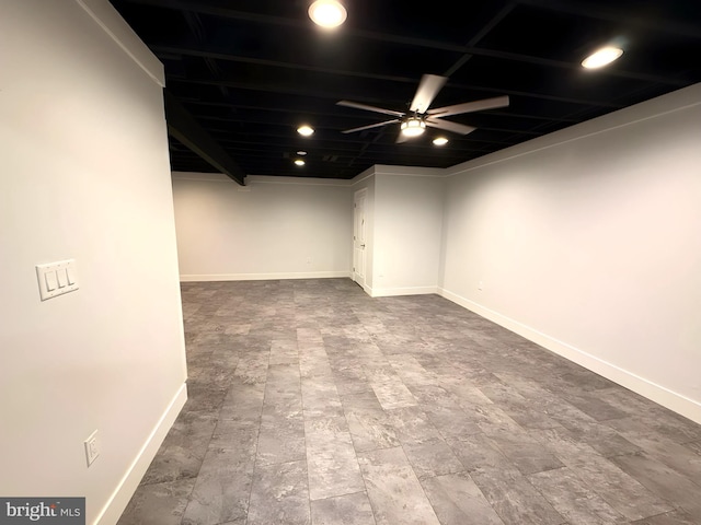 basement with ceiling fan